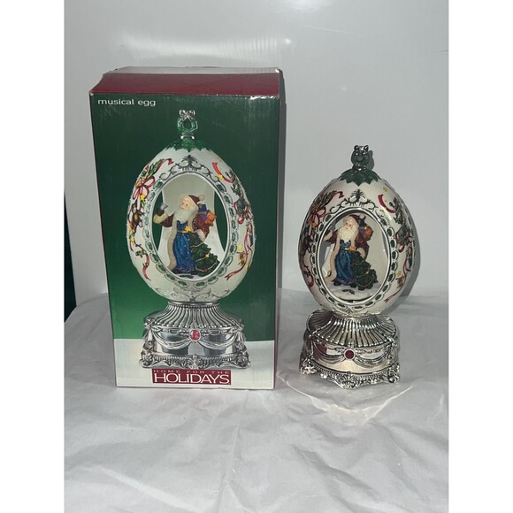 Home For The Holidays Musical Egg. Santa Claus Carousel Music Box.